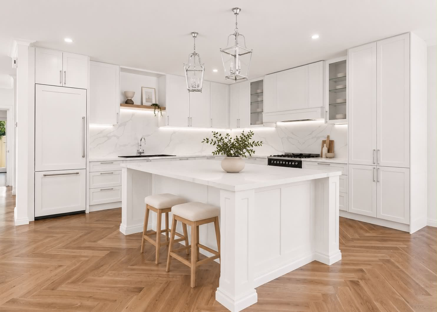Bright white kitchen with island cabinetry by Masterpiece Cabinetry